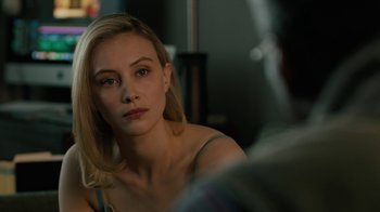 Movie still from “True Detective” (2014), created by Issa López – A beautiful young lady sitting in front of a mirror; Close Up shot, Over the shoulder angle