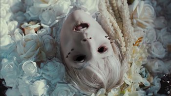 Movie still from “Alice Glass - Without Love” (2017), directed by Floria Sigismondi – Extreme Close Up shot, Overhead angle