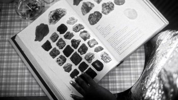 Movie still from “Danny Brown - Lost” (2017), directed by Matilda Finn – Extreme Close Up shot, Overhead angle