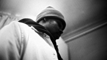 Movie still from “Danny Brown - Lost” (2017), directed by Matilda Finn – Extreme Close Up shot, Low angle