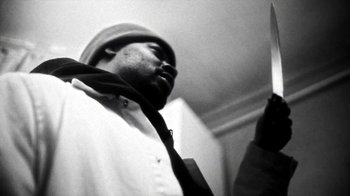 Movie still from “Danny Brown - Lost” (2017), directed by Matilda Finn – Extreme Close Up shot, Low angle