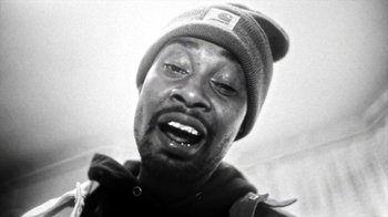 Movie still from “Danny Brown - Lost” (2017), directed by Matilda Finn – Extreme Close Up shot, Low angle