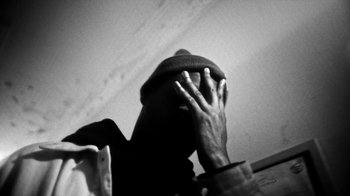 Movie still from “Danny Brown - Lost” (2017), directed by Matilda Finn – Extreme Close Up shot, Overhead angle