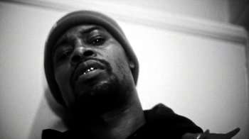 Movie still from “Danny Brown - Lost” (2017), directed by Matilda Finn – Extreme Close Up shot, Low angle