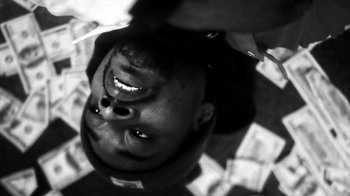 Movie still from “Danny Brown - Lost” (2017), directed by Matilda Finn – Extreme Close Up shot, Overhead angle