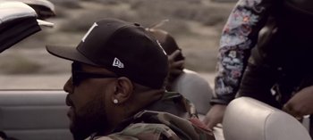 Movie still from “Mike WiLL Made-It - Perfect Pint” (2017), directed by Nabil Elderkin – Close Up shot, Over the shoulder angle