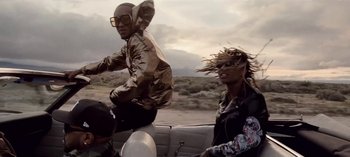 Movie still from “Mike WiLL Made-It - Perfect Pint” (2017), directed by Nabil Elderkin – Medium shot, Low angle