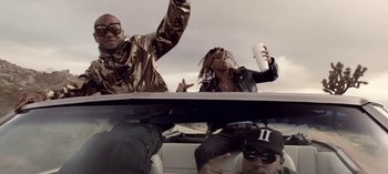 Movie still from “Mike WiLL Made-It - Perfect Pint” (2017), directed by Nabil Elderkin – Medium shot, Low angle