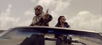 Movie still from “Mike WiLL Made-It - Perfect Pint” (2017), directed by Nabil Elderkin – Medium shot, Low angle