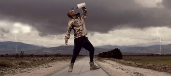 Movie still from “Mike WiLL Made-It - Perfect Pint” (2017), directed by Nabil Elderkin – Wide shot, Low angle