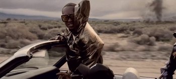 Movie still from “Mike WiLL Made-It - Perfect Pint” (2017), directed by Nabil Elderkin – Medium shot, Low angle