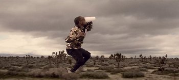 Movie still from “Mike WiLL Made-It - Perfect Pint” (2017), directed by Nabil Elderkin – Wide shot, Low angle