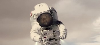 Movie still from “Mike WiLL Made-It - Perfect Pint” (2017), directed by Nabil Elderkin – Medium shot, Low angle