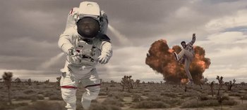 Movie still from “Mike WiLL Made-It - Perfect Pint” (2017), directed by Nabil Elderkin – Wide shot, Low angle