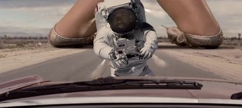 Movie still from “Mike WiLL Made-It - Perfect Pint” (2017), directed by Nabil Elderkin – Medium shot, Low angle