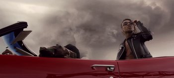 Movie still from “Mike WiLL Made-It - Perfect Pint” (2017), directed by Nabil Elderkin – Medium shot, Low angle