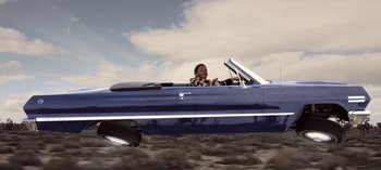 Movie still from “Mike WiLL Made-It - Perfect Pint” (2017), directed by Nabil Elderkin – Wide shot, Low angle