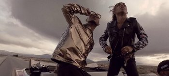 Movie still from “Mike WiLL Made-It - Perfect Pint” (2017), directed by Nabil Elderkin – Medium shot, Low angle