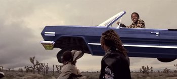 Movie still from “Mike WiLL Made-It - Perfect Pint” (2017), directed by Nabil Elderkin – Wide shot, Low angle