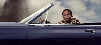 Movie still from “Mike WiLL Made-It - Perfect Pint” (2017), directed by Nabil Elderkin – Medium shot, Low angle