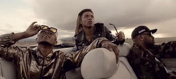 Movie still from “Mike WiLL Made-It - Perfect Pint” (2017), directed by Nabil Elderkin – Medium shot, Low angle