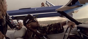 Movie still from “Mike WiLL Made-It - Perfect Pint” (2017), directed by Nabil Elderkin – Medium shot, Over the shoulder angle