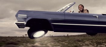 Movie still from “Mike WiLL Made-It - Perfect Pint” (2017), directed by Nabil Elderkin – Wide shot, Low angle