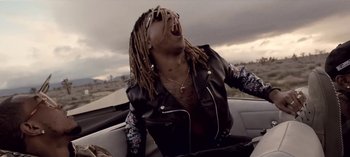 Movie still from “Mike WiLL Made-It - Perfect Pint” (2017), directed by Nabil Elderkin – Medium shot, Low angle