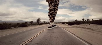 Movie still from “Mike WiLL Made-It - Perfect Pint” (2017), directed by Nabil Elderkin – Wide shot, Low angle