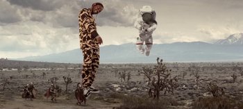 Movie still from “Mike WiLL Made-It - Perfect Pint” (2017), directed by Nabil Elderkin – Wide shot, Low angle