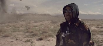 Movie still from “Mike WiLL Made-It - Perfect Pint” (2017), directed by Nabil Elderkin – Medium shot, Low angle