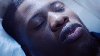 Movie still from “Obongjayar - Endless” (2017), directed by Matilda Finn – Extreme Close Up shot, Overhead angle