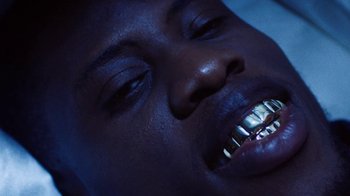 Movie still from “Obongjayar - Endless” (2017), directed by Matilda Finn – Extreme Close Up shot, Overhead angle