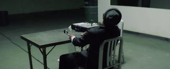 Movie still from “Kendrick Lamar - DNA.” (2017), directed by Nabil Elderkin – Medium shot, High angle