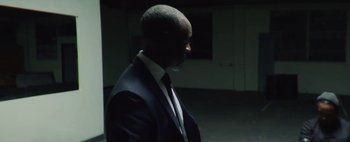 Movie still from “Kendrick Lamar - DNA.” (2017), directed by Nabil Elderkin – Medium shot, Over the shoulder angle