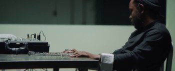 Movie still from “Kendrick Lamar - DNA.” (2017), directed by Nabil Elderkin – Medium shot, Low angle
