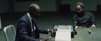 Movie still from “Kendrick Lamar - DNA.” (2017), directed by Nabil Elderkin – Medium shot, Low angle