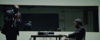 Movie still from “Kendrick Lamar - DNA.” (2017), directed by Nabil Elderkin – Medium shot, Low angle