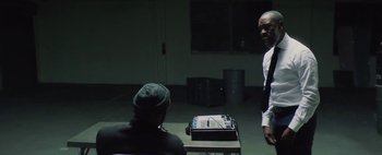 Movie still from “Kendrick Lamar - DNA.” (2017), directed by Nabil Elderkin – Medium shot, Over the shoulder angle