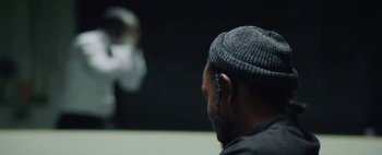 Movie still from “Kendrick Lamar - DNA.” (2017), directed by Nabil Elderkin – Close Up shot, Over the shoulder angle