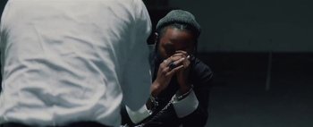 Movie still from “Kendrick Lamar - DNA.” (2017), directed by Nabil Elderkin – Close Up shot, Over the shoulder angle
