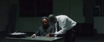 Movie still from “Kendrick Lamar - DNA.” (2017), directed by Nabil Elderkin – Medium shot, Over the shoulder angle