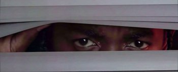 Movie still from “Kendrick Lamar - DNA.” (2017), directed by Nabil Elderkin – Extreme Close Up shot, Low angle