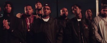 Movie still from “Kendrick Lamar - DNA.” (2017), directed by Nabil Elderkin – Medium shot, Low angle