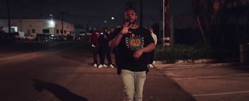 Movie still from “Kendrick Lamar - DNA.” (2017), directed by Nabil Elderkin – Medium shot, Low angle