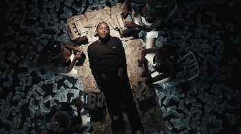 Movie still from “Kendrick Lamar - HUMBLE.” (2017), directed by Dave Meyers – Medium shot, Overhead angle
