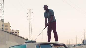 Movie still from “Kendrick Lamar - HUMBLE.” (2017), directed by Dave Meyers – Wide shot, Low angle
