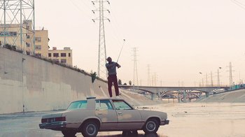 Movie still from “Kendrick Lamar - HUMBLE.” (2017), directed by Dave Meyers – Wide shot, Low angle