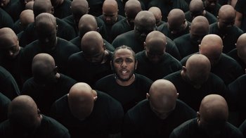 Movie still from “Kendrick Lamar - HUMBLE.” (2017), directed by Dave Meyers – Medium shot, High angle