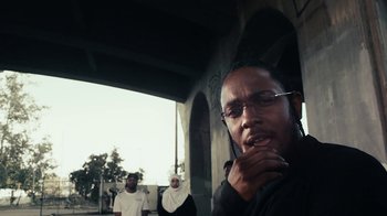 Movie still from “Kendrick Lamar - HUMBLE.” (2017), directed by Dave Meyers – Close Up shot, Low angle